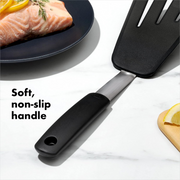 OXO Good Grips Silicone Flexible Omelet Turner with extra-wide heat-resistant head and non-slip handle.