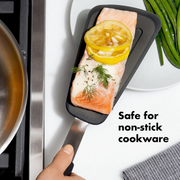 OXO Good Grips Silicone Flexible Omelet Turner with extra-wide heat-resistant head and non-slip handle.