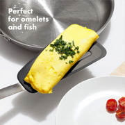 OXO Good Grips Silicone Flexible Omelet Turner with extra-wide heat-resistant head and non-slip handle.