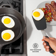OXO Good Grips Small Silicone Flexible Turner with thin heat-resistant head and non-slip handle.
