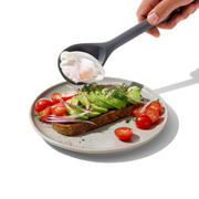 OXO Good Grips Silicone Slotted Spoon with black silicone head and soft non-slip handle.