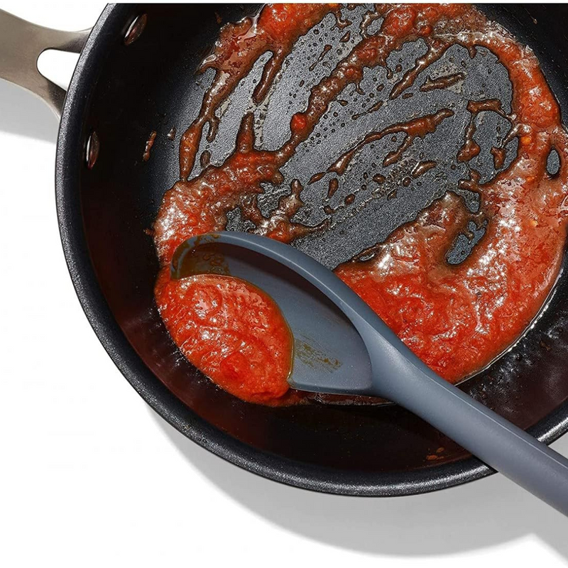 OXO Good Grips Silicone Spoon with black silicone head and soft non-slip handle.