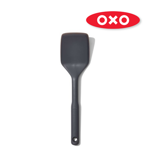 OXO Good Grips Silicone Turner with black silicone head and soft non-slip handle.