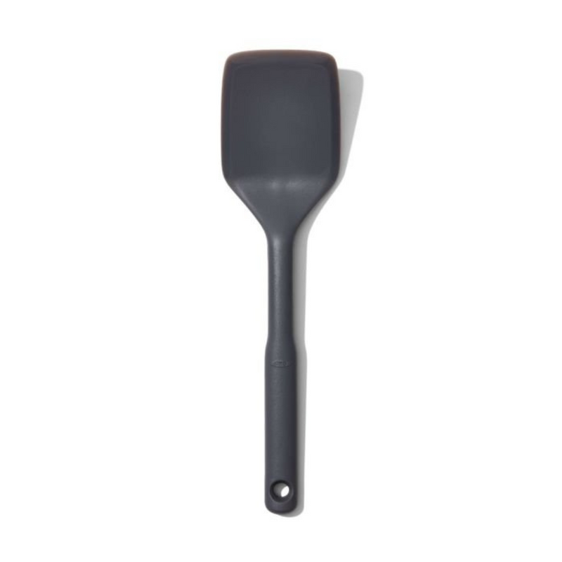OXO Good Grips Silicone Turner with black silicone head and soft non-slip handle.