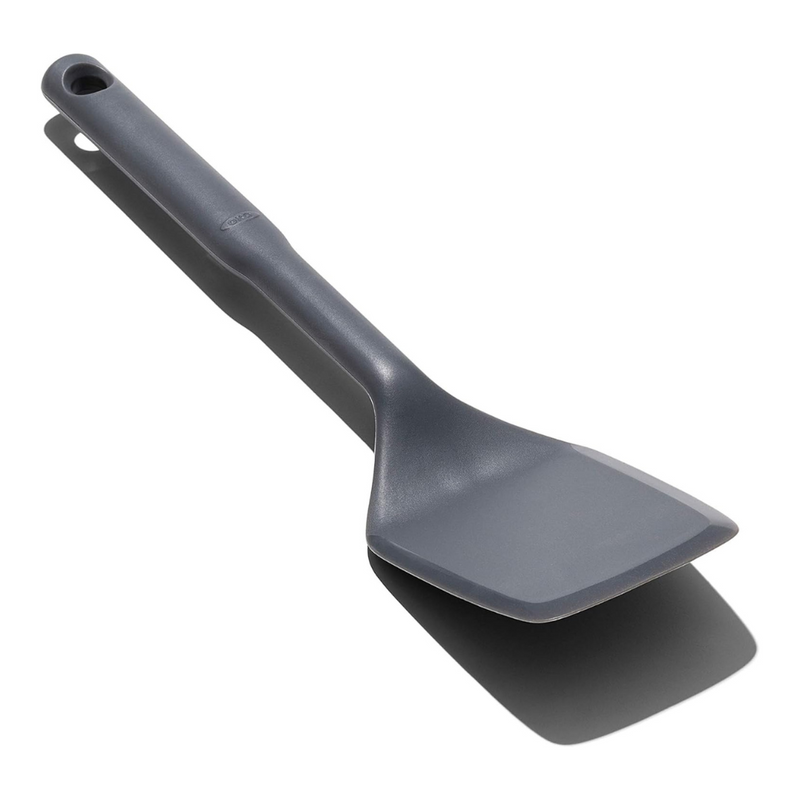 OXO Good Grips Silicone Turner with black silicone head and soft non-slip handle.