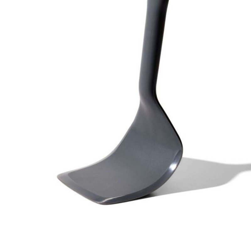 OXO Good Grips Silicone Turner with black silicone head and soft non-slip handle.