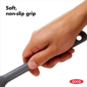 OXO Good Grips Silicone Turner with black silicone head and soft non-slip handle.