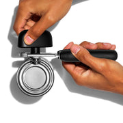 OXO Good Grips Soft-Handled Can Opener with black handles and stainless steel cutting wheels