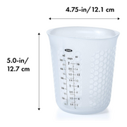 OXO Good Grips 2-Cup / 500ml Squeeze & Pour Measuring Cup with flexible silicone body and clear measurement markings.