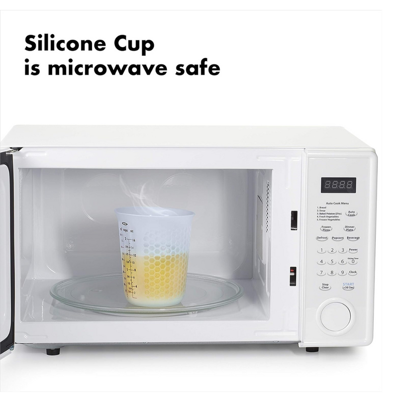 OXO Good Grips 2-Cup / 500ml Squeeze & Pour Measuring Cup with flexible silicone body and clear measurement markings.