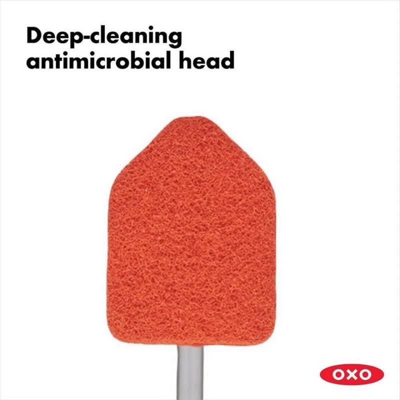 OXO Good Grips Extendable Tub and Tile Scrubber cleaning bathroom tiles