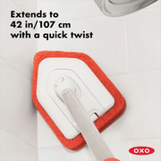 OXO Good Grips Extendable Tub and Tile Scrubber cleaning bathroom tiles