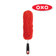 OXO Good Grips Microfiber Hand Duster cleaning a shelf