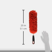 OXO Good Grips Microfiber Hand Duster cleaning a shelf