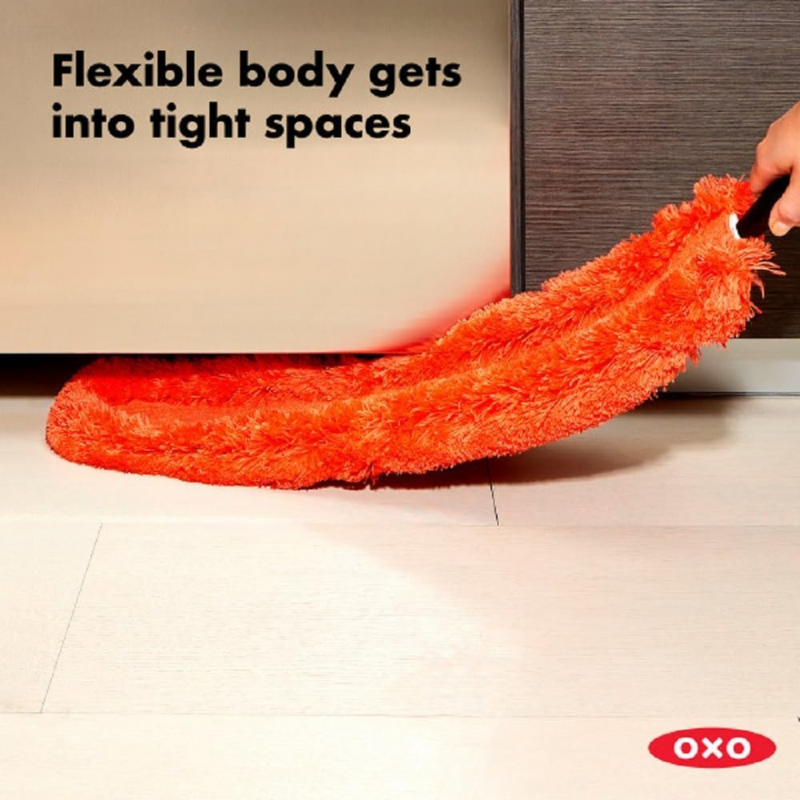 OXO Good Grips Microfiber Hand Duster cleaning a shelf