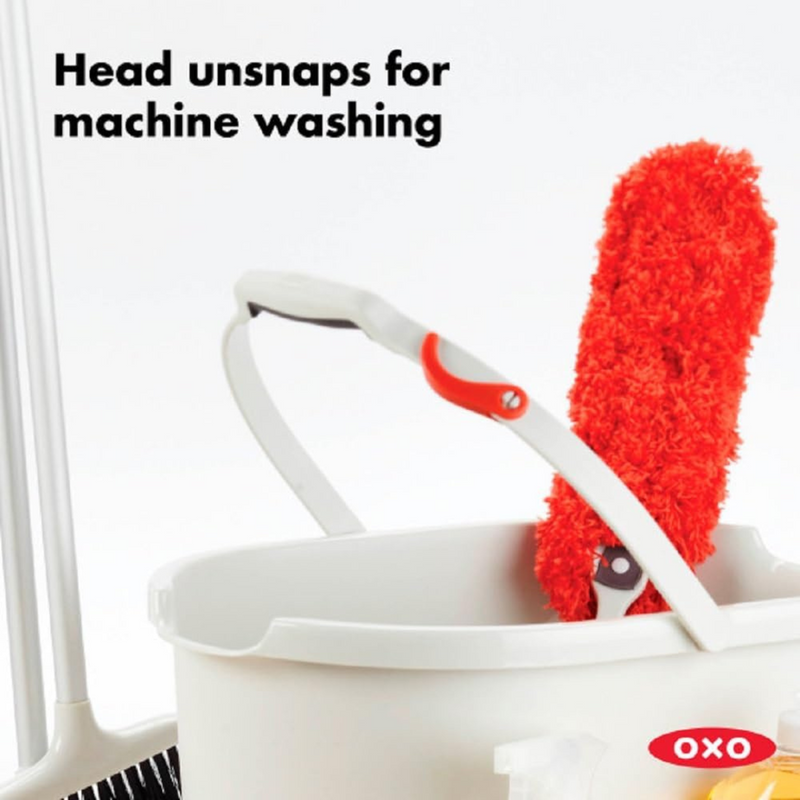 OXO Good Grips Microfiber Hand Duster cleaning a shelf