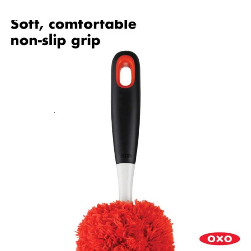 OXO Good Grips Microfiber Hand Duster cleaning a shelf