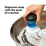 OXO Good Grips Soap Dispensing Palm Brush with stand