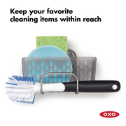 OXO Good Grips Stronghold Suction Sink Caddy attached to sink wall