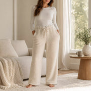 Ladies long plush PJ pants with pockets in assorted designs, offering soft, cosy comfort for sleep and relaxing at home. – thumbnail