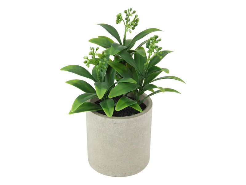Artificial green plant in pot