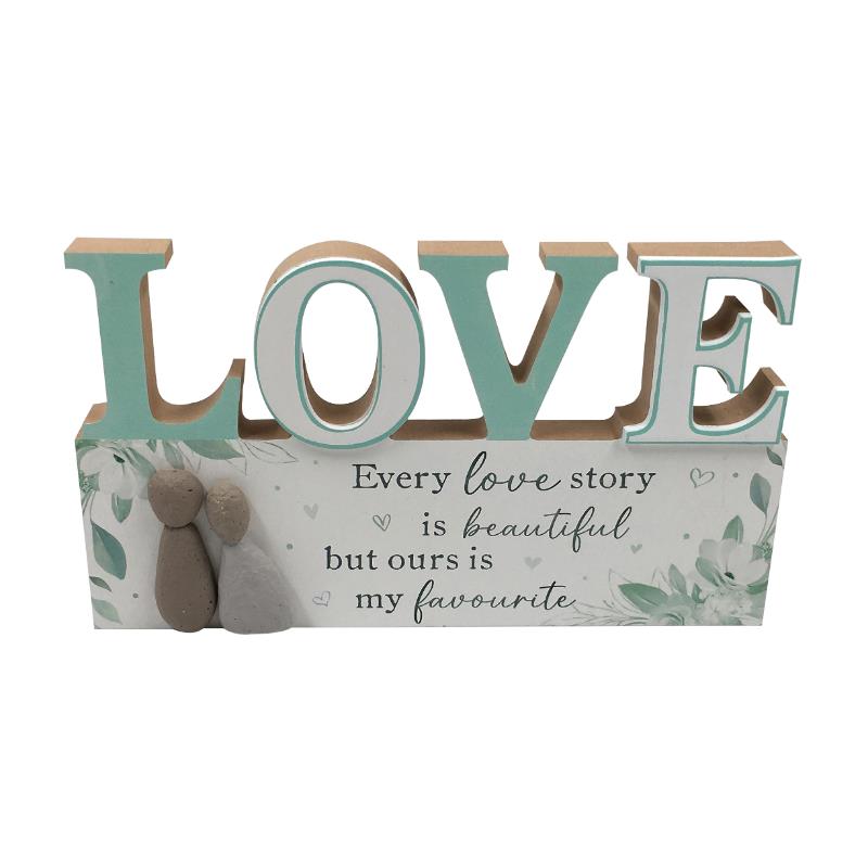 Wall plaque with pebble art couple