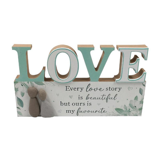 Wall plaque with pebble art couple