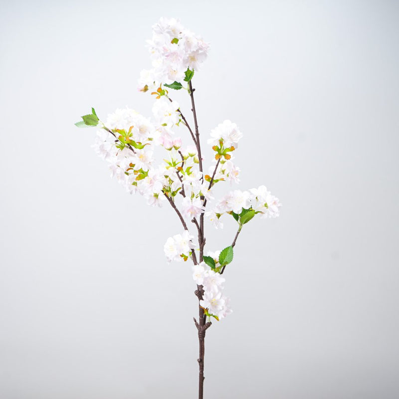 Light pink cherry blossom spray with realistic blooms