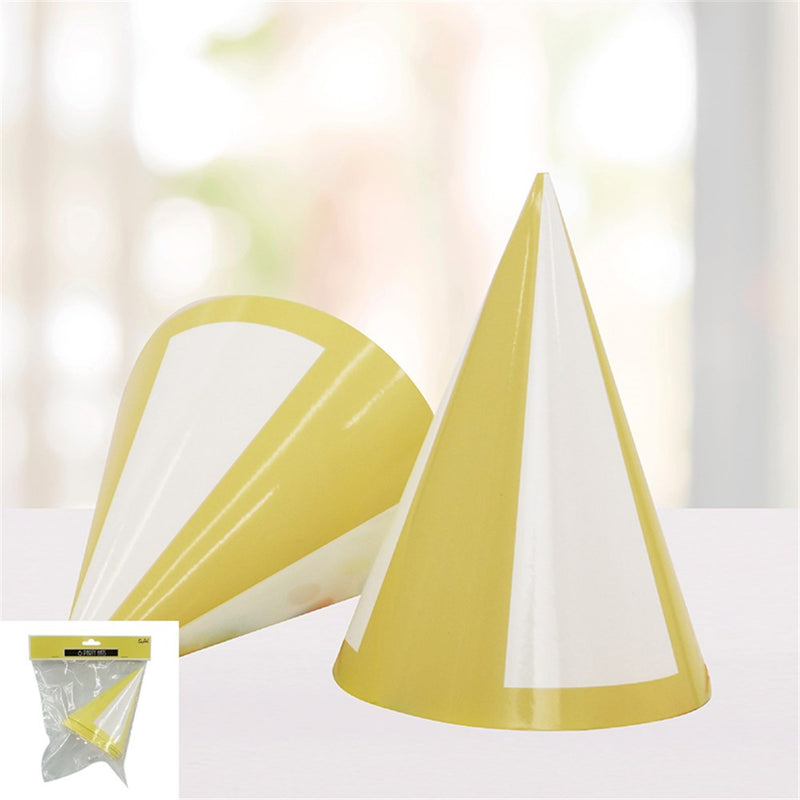 Yellow paper party hats with tassel