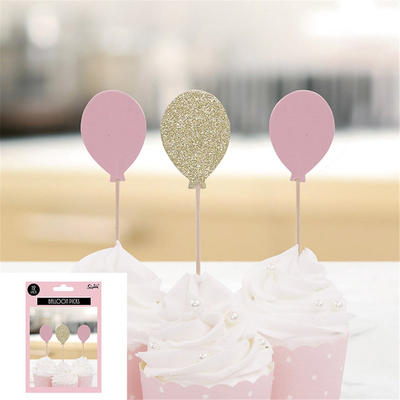 Pink and champagne balloon cake picks