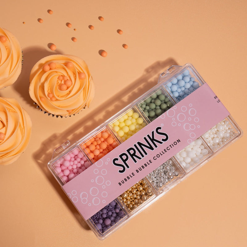 Box of assorted spherical sprinkles bubble theme