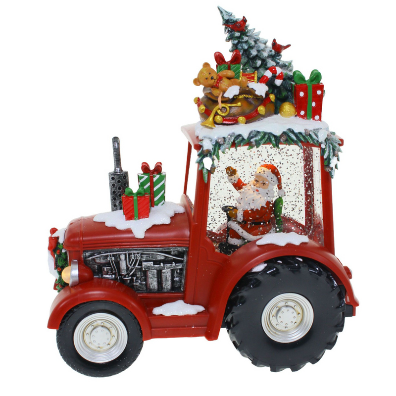 Santa driving red tractor with gifts for Christmas decoration