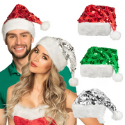 Assorted shiny Santa hats with disco ball toppers in festive colours, fun Christmas party accessories