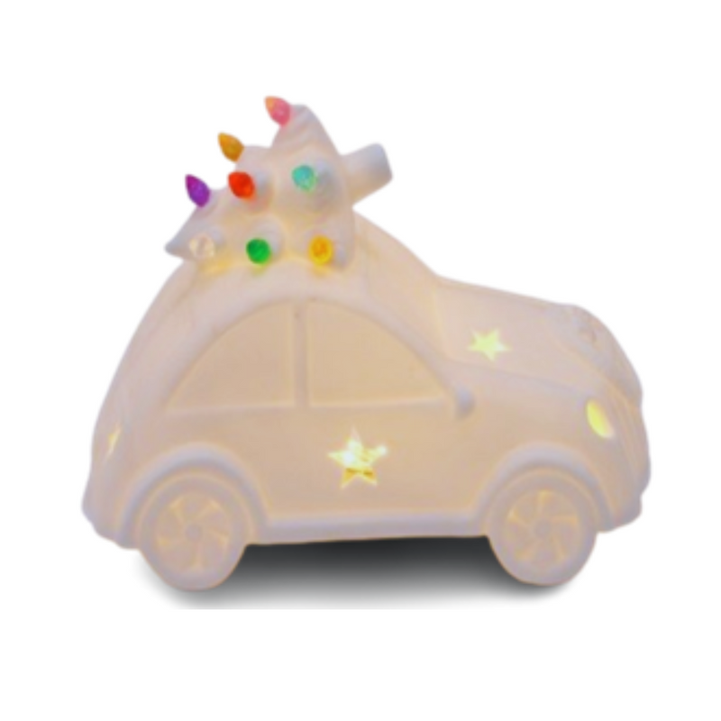 Rustic stone-look car with Christmas tree on top and LED lights for festive indoor decoration