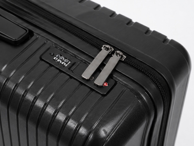 Black suitcase with a visible brand logo on a white background
