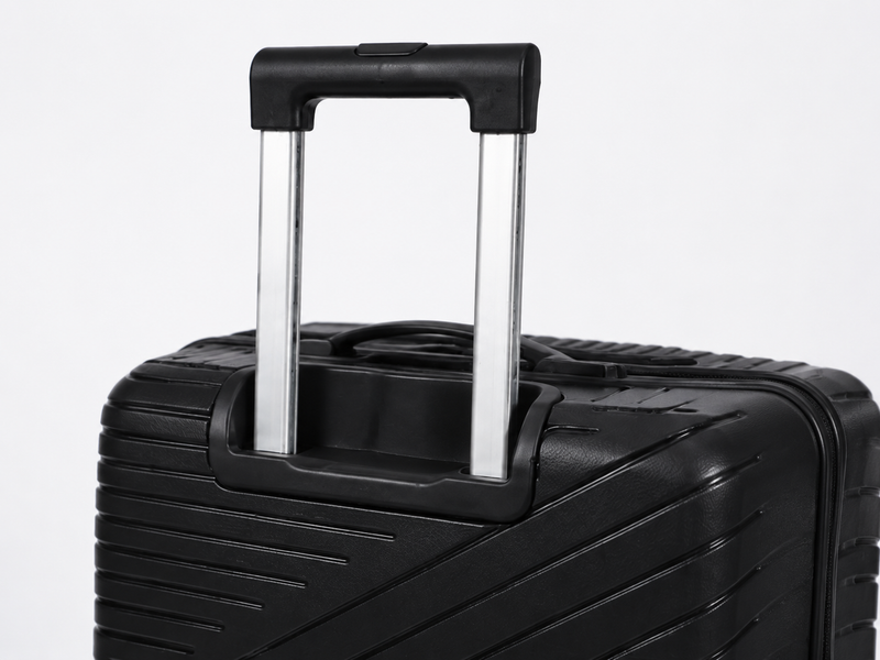 Black suitcase with a handle on a white background