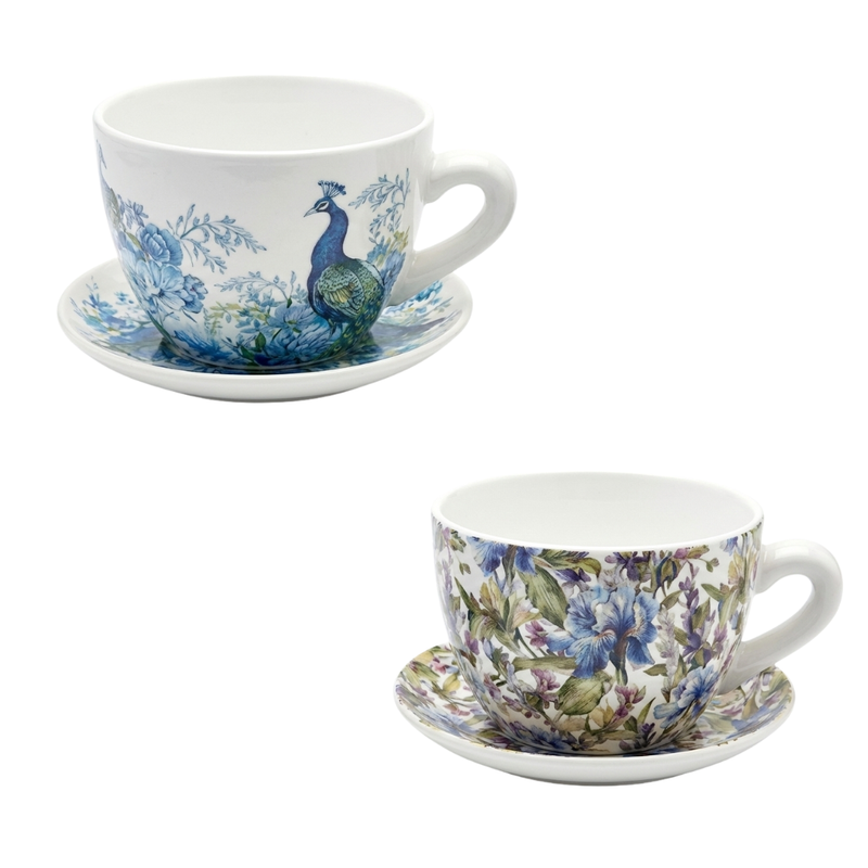 Two teacups with floral and peacock designs on a white background