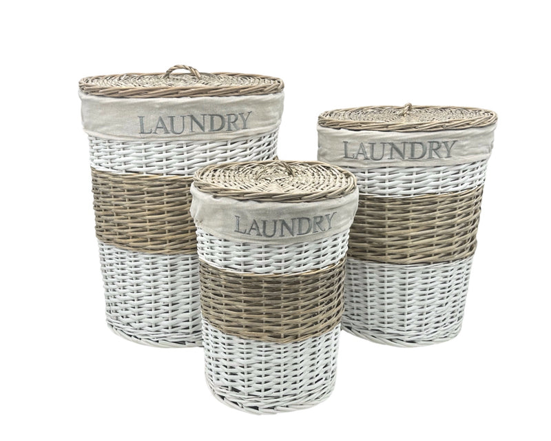 Set of three round willow laundry baskets in natural woven style