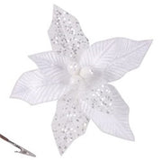 White decorative flower with rhinestones and a hair clip on a white background
