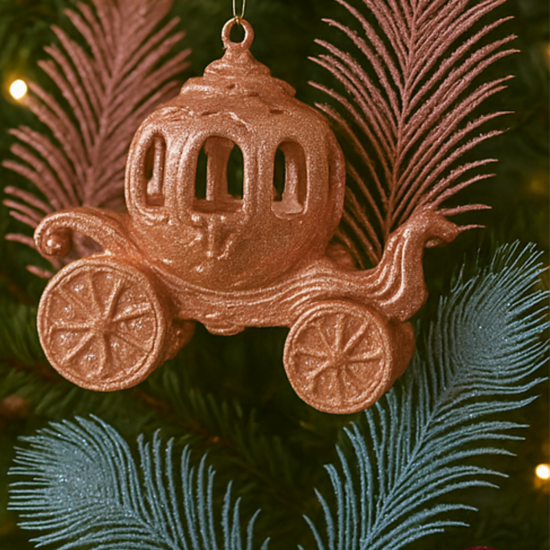 Copper-colored carriage ornament on a Christmas tree