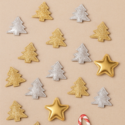 Decorative Christmas tree and star ornaments on a beige background