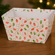 Rectangular box with Christmas light pattern on a wooden surface