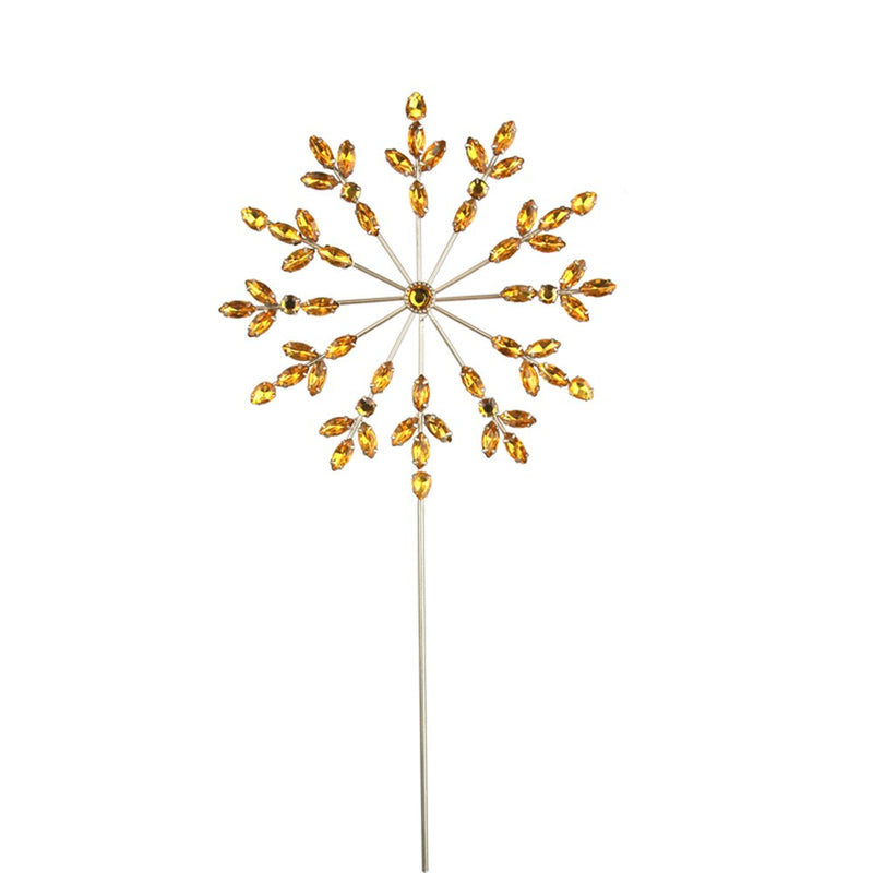 metal snowflake Christmas tree topper with amber gems