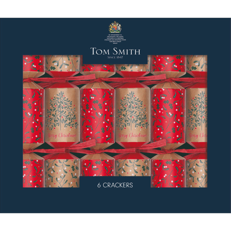 Kraft mini Tom Smith Christmas crackers styled with greenery on a table.