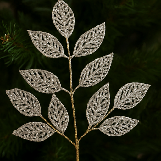Decorative silver leaf branch against a dark green background