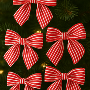 Red and white striped bows on a Christmas tree.