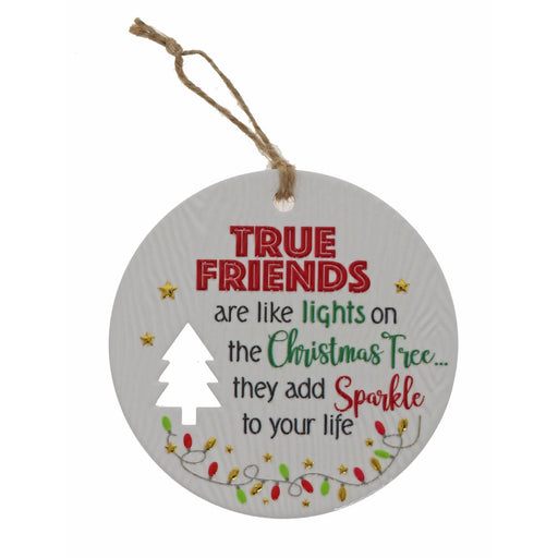 Holiday wall sign reading True Friends with greenery