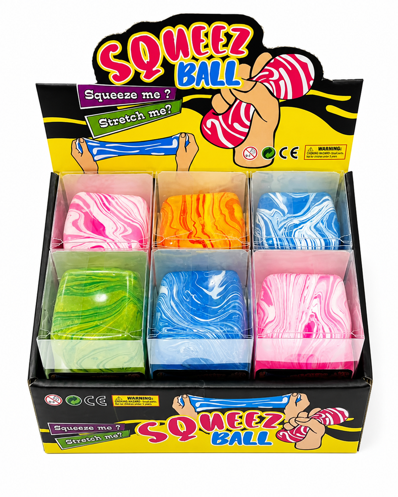 Colourful cube-shaped squeeze balls with marble designs, individually boxed and arranged in a product display. Squishy toys