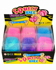 Display box of Squeez Ball toys with colorful balls inside – thumbnail