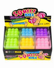 Display box of Squeeze Ball toys with colorful balls inside – thumbnail